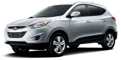 2012 Hyundai Tucson GLS PZEV in Chai Bronze — front three-quarter view